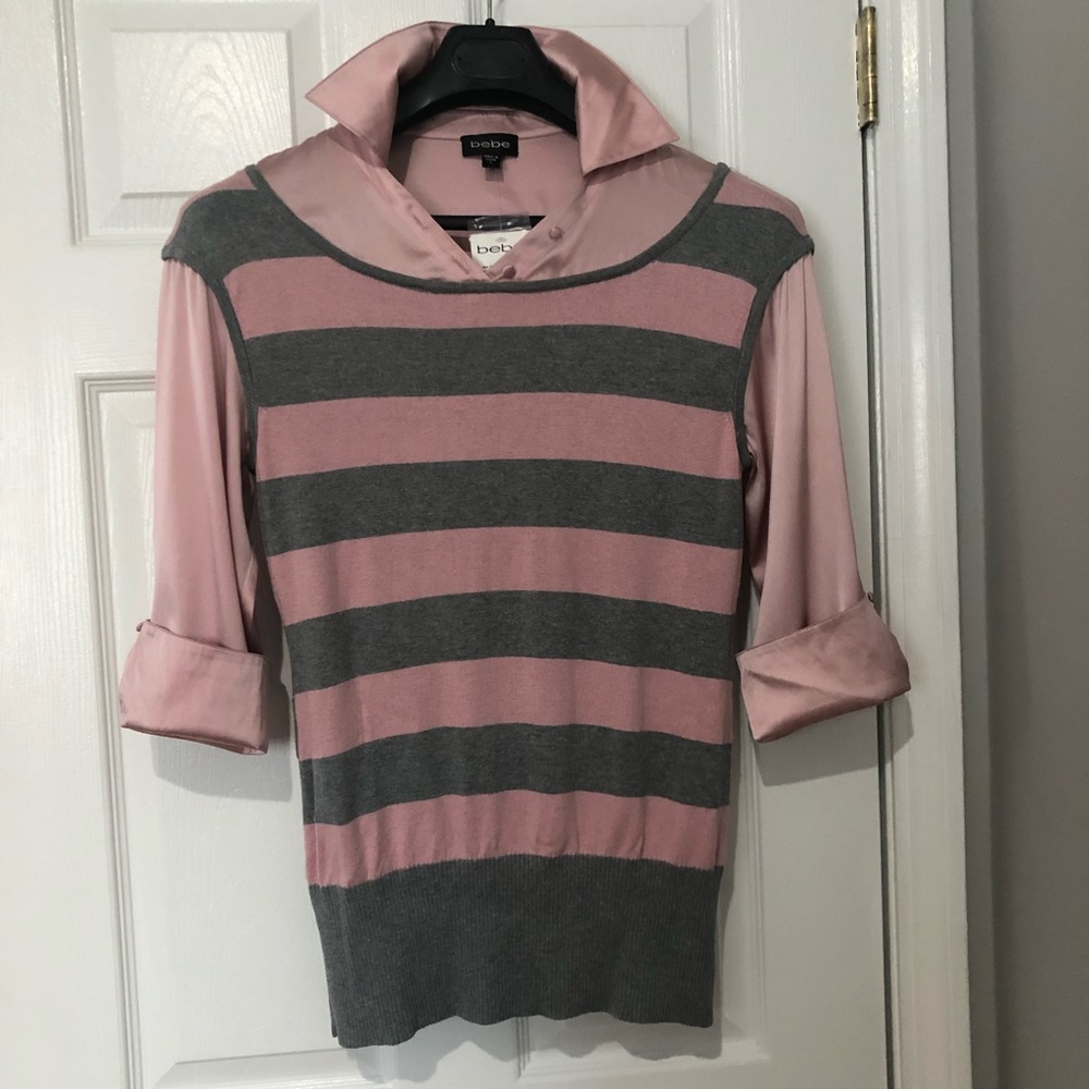 NWT. BEBE Sweater Blouse. Color Pink & Grey SizeL.